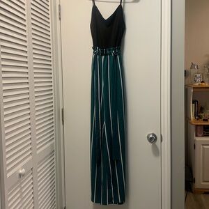 Super cute striped jumpsuit!! Only worn once.